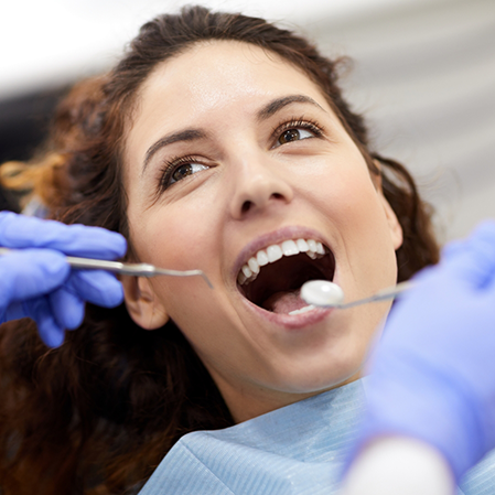 Woman receiving a dental checkup