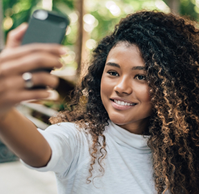 Young woman taking a selfie